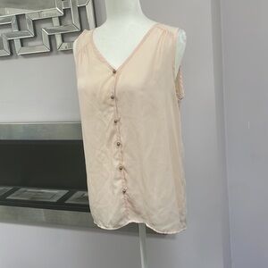 Oddy see-through, sleeveless top